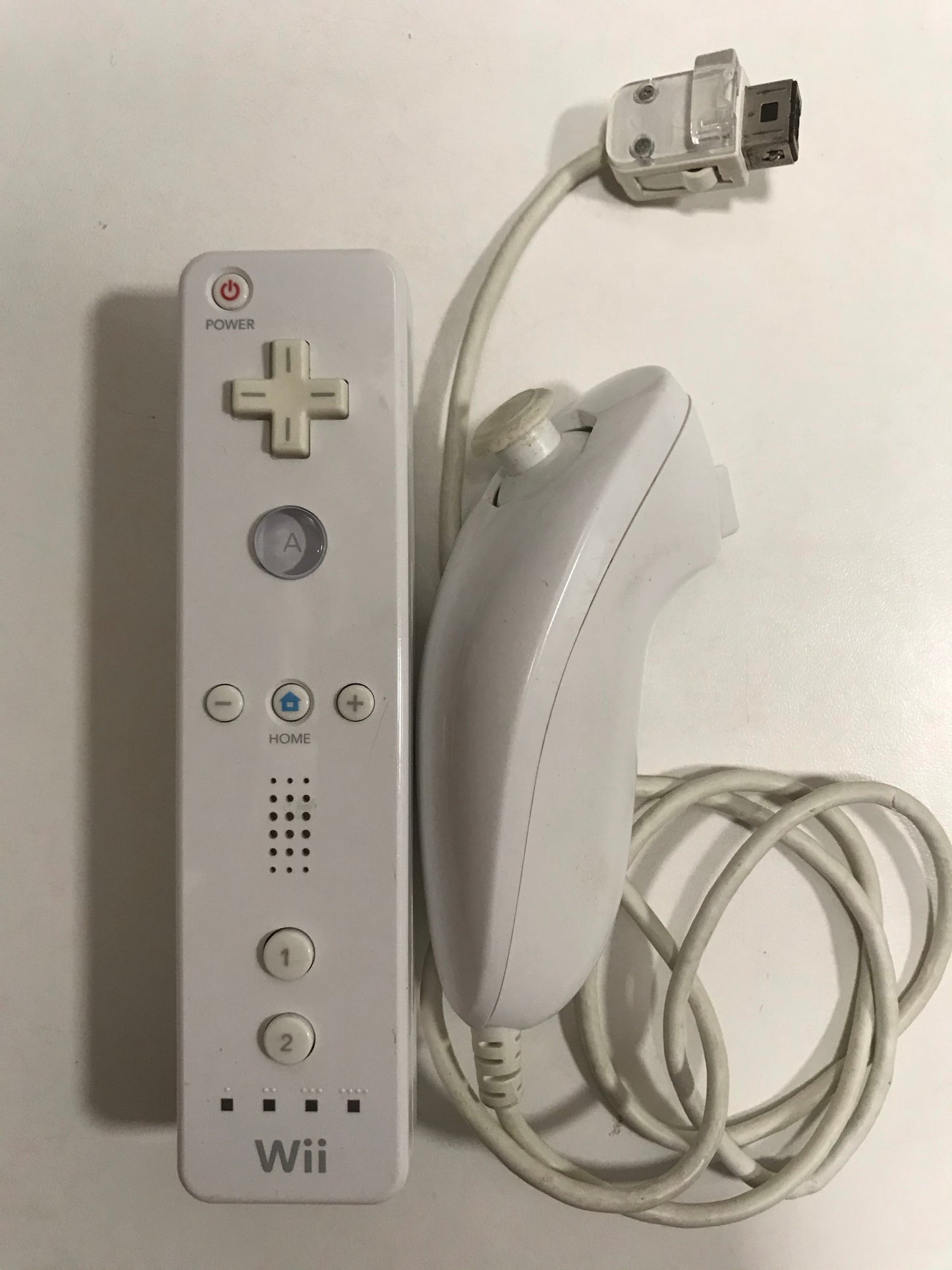 Nintendo wii + 8 jeux + 1 manette + 1 nunshock