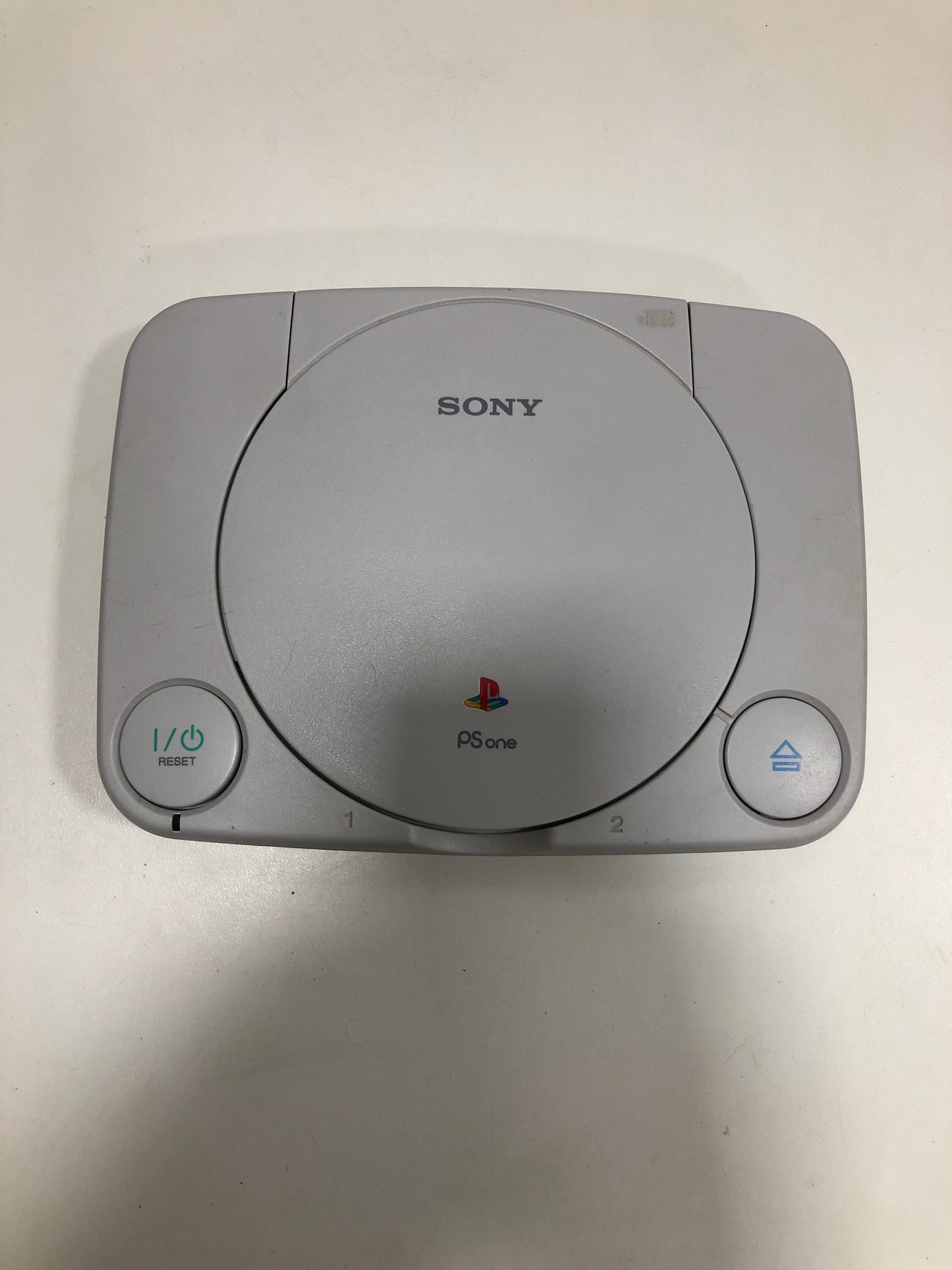 Sony ps one + 8 jeux + 1 manette + rallonge +carte mémoire