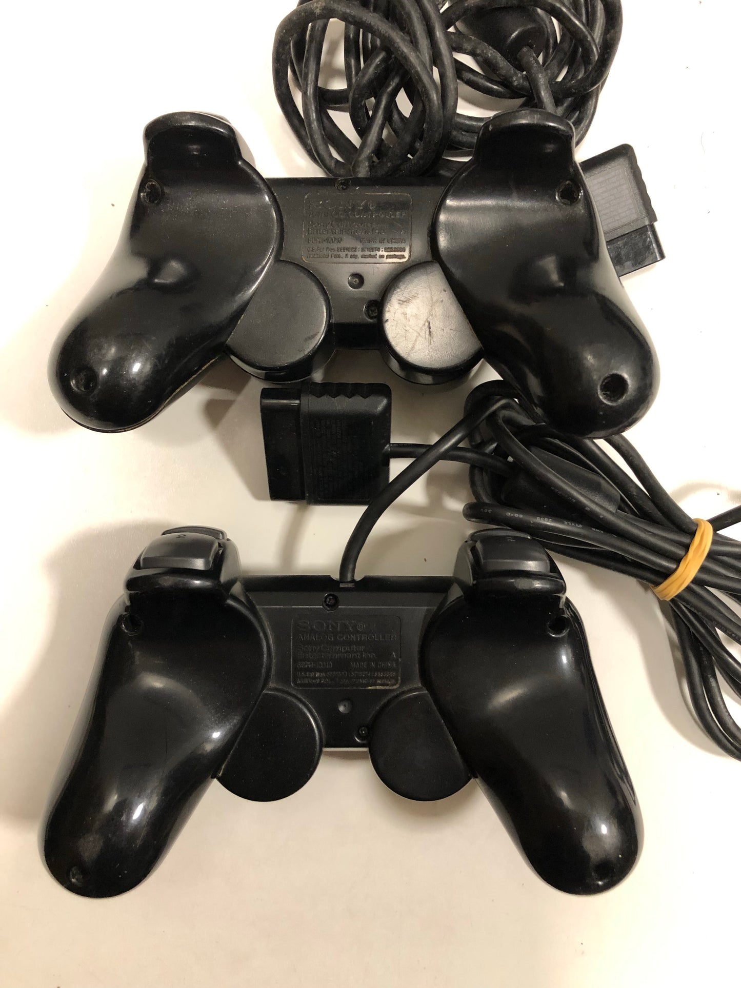 Sony PS2 slim + 2 manettes + 8 jeux +carte mémoire