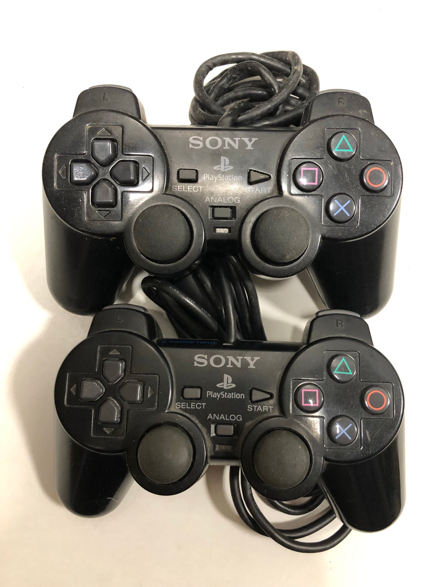 Sony PS2 slim + 2 manettes + 8 jeux +carte mémoire