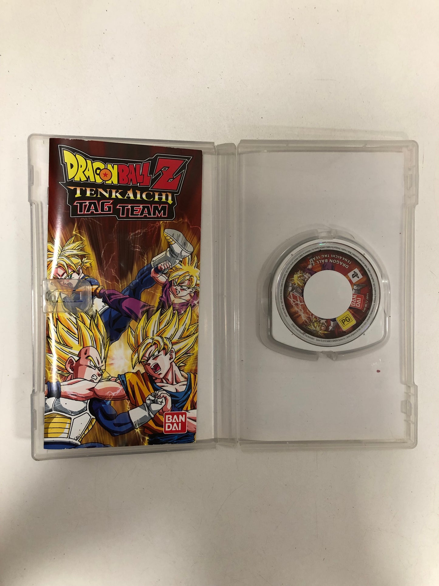 Dragon ball z tenkaichi tag team avec notice  Sony psp + carte a jouer dragon ball